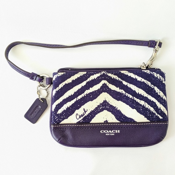 Coach Handbags - COACH purple zebra canvas leather zip wristlet Coach Handbags - COACH purple zebra canvas leather zip wristlet